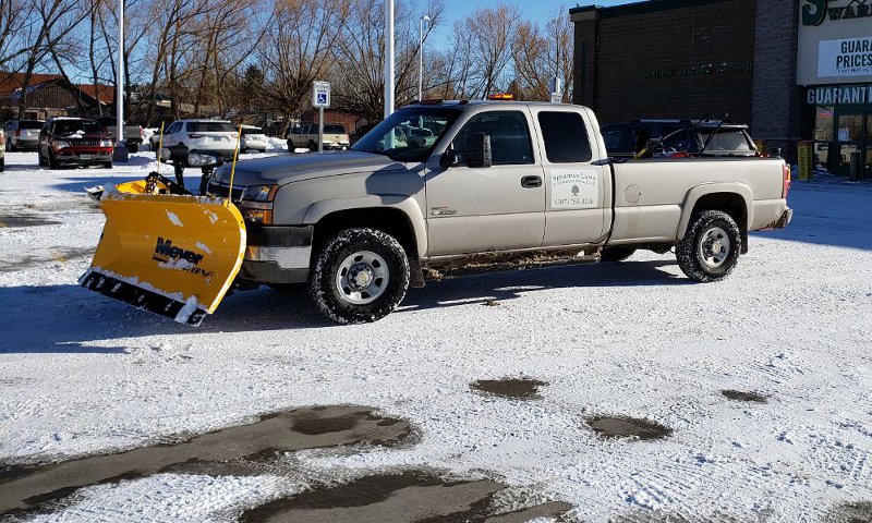 Snow Plowing Services by Sheridan Lawn and Landscaping, LLC